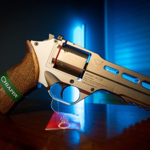 Chiappa Rhino 50DS revolver with wood grip on wood table
