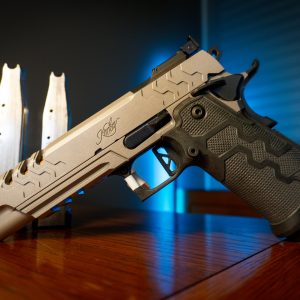 Kimber 2K11 Target 9mm pistol on wood table with magazines