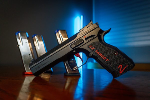 CZ Shadow 2 9mm pistol with magazines on wood table