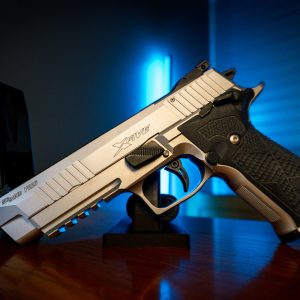 Sig Sauer P226 XFive pistol on wood table, left angle