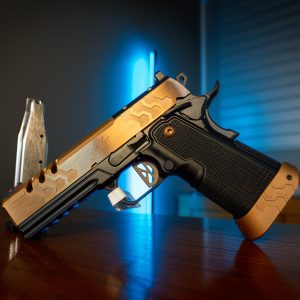 Kimber 2K11 Pro Coyote pistol on wood table, left angle