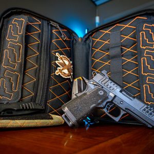 Staccato C V3 Duane Dwyer pistol set in open case on wood table