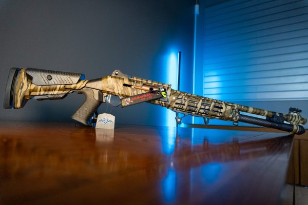 Orthos Raider S4 Bottomland Elite 12 gauge shotgun in camo, left side