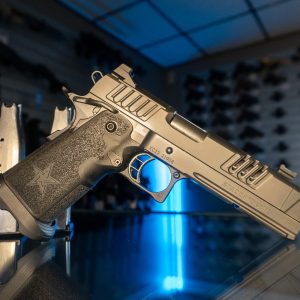 Staccato XC 9mm pistol on glass counter, left angle