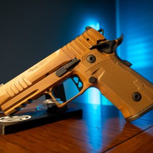 Sig Sauer P211 GT4 Coyote 9mm pistol on stand, left angle