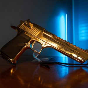 Magnum Research Desert Eagle .357 Magnum in gold finish, left angle