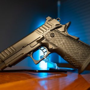 Staccato C2 9mm pistol on stand, left angle