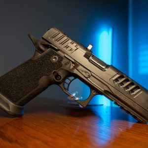 Staccato HD P4.5 9mm pistol on wood table, left angle