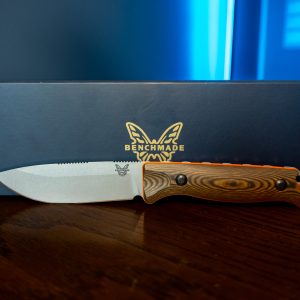 Benchmade Saddle Mountain Skinner knife with wood handle by box