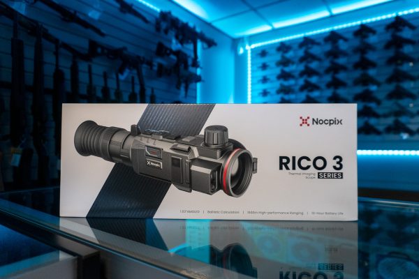 Nocpix Rico 3 thermal imaging rifle scope retail box on a glass store counter