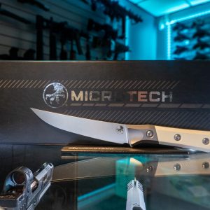 Microtech boning knife with ivory G-10 handle in display box