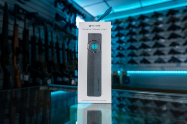 Olight ArkPro 1500 lumen flashlight in retail box