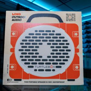 Turtlebox Gen 2 portable speaker in orange retail box, front