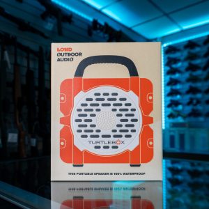 Turtlebox portable speaker in retail box, angled view