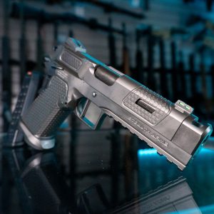 Stealth Arms Platypus 17 9mm pistol on glass counter, front angle