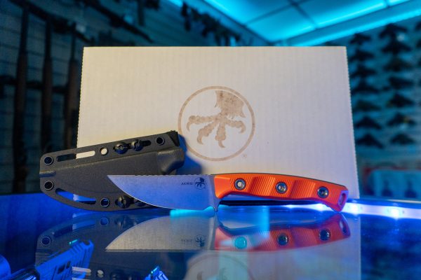 Microtech Akris fixed blade knife with stonewash blade, orange Ember G-10 handle and Kydex sheath