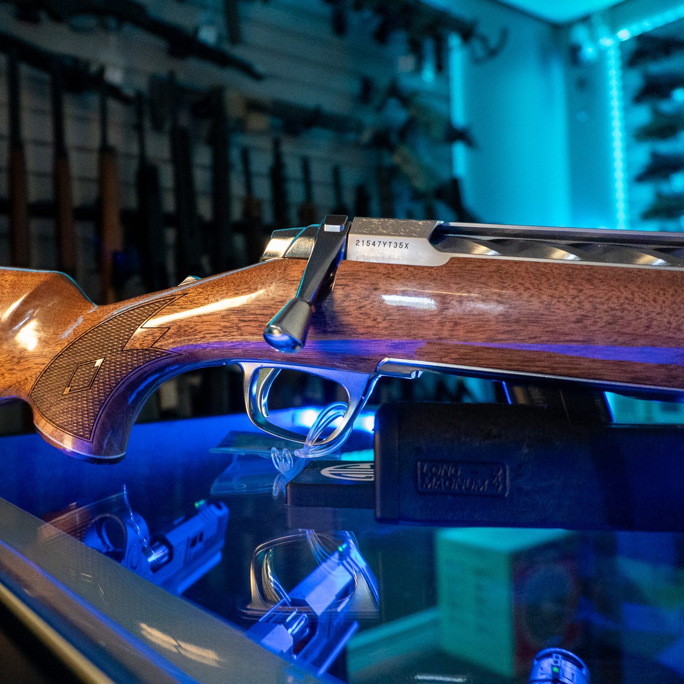 Browning X-Bolt 2 White Gold Medallion gloss walnut stock with point-style checkering, polished bolt, engraved stainless receiver and Long Magnum magazine