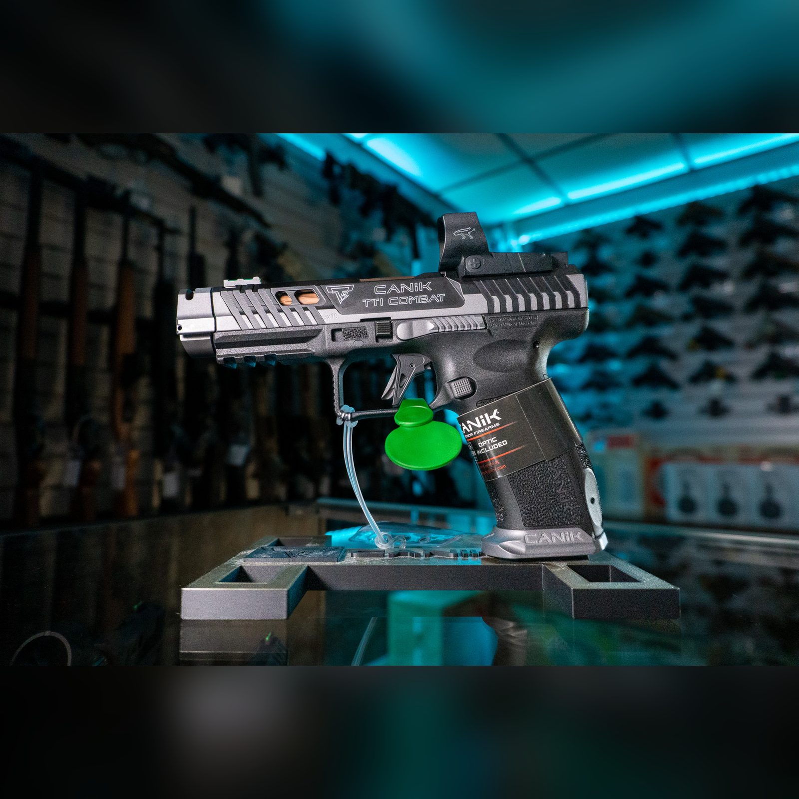 Canik TTI Combat Smoke 9mm pistol with MECANIK MO3 red dot, gray Cerakote ported slide with bronze accents and gray aluminum magwell, left side
