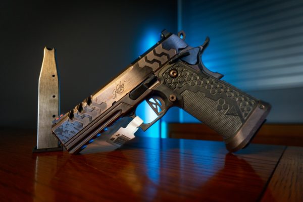 Kimber 2K11 Pro Royal 9mm pistol with magazine, left angle