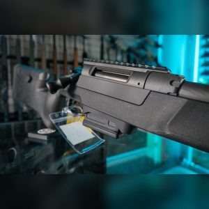Close-up of the Daniel Defense DELTA 5 .308 action, ejection port, 20 MOA Picatinny rail and detachable magazine