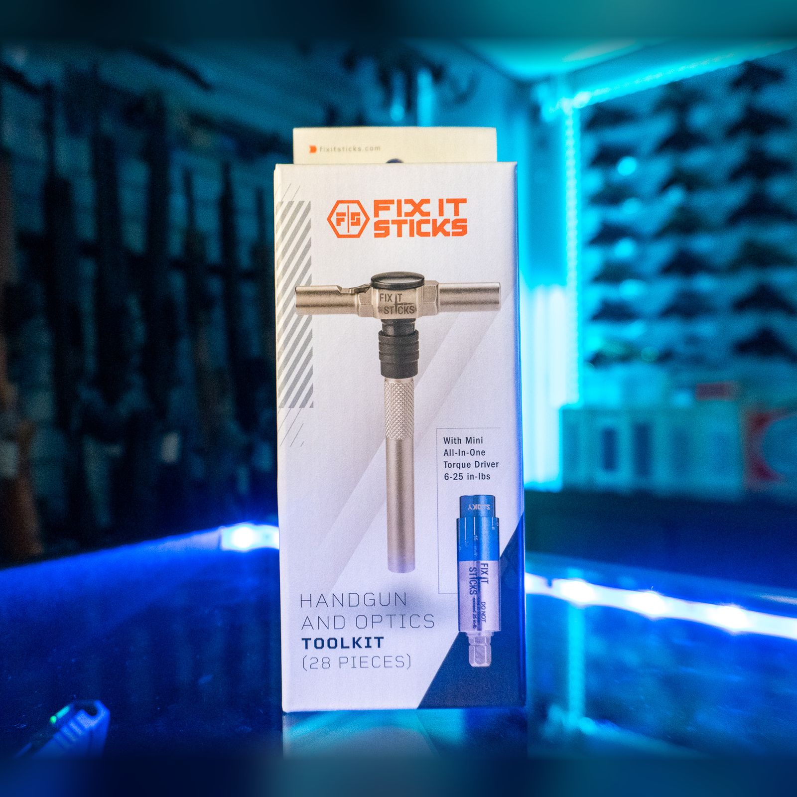 Fix It Sticks Handgun and Optics Toolkit with Mini All-In-One Torque Driver in its retail box on a glass store counter