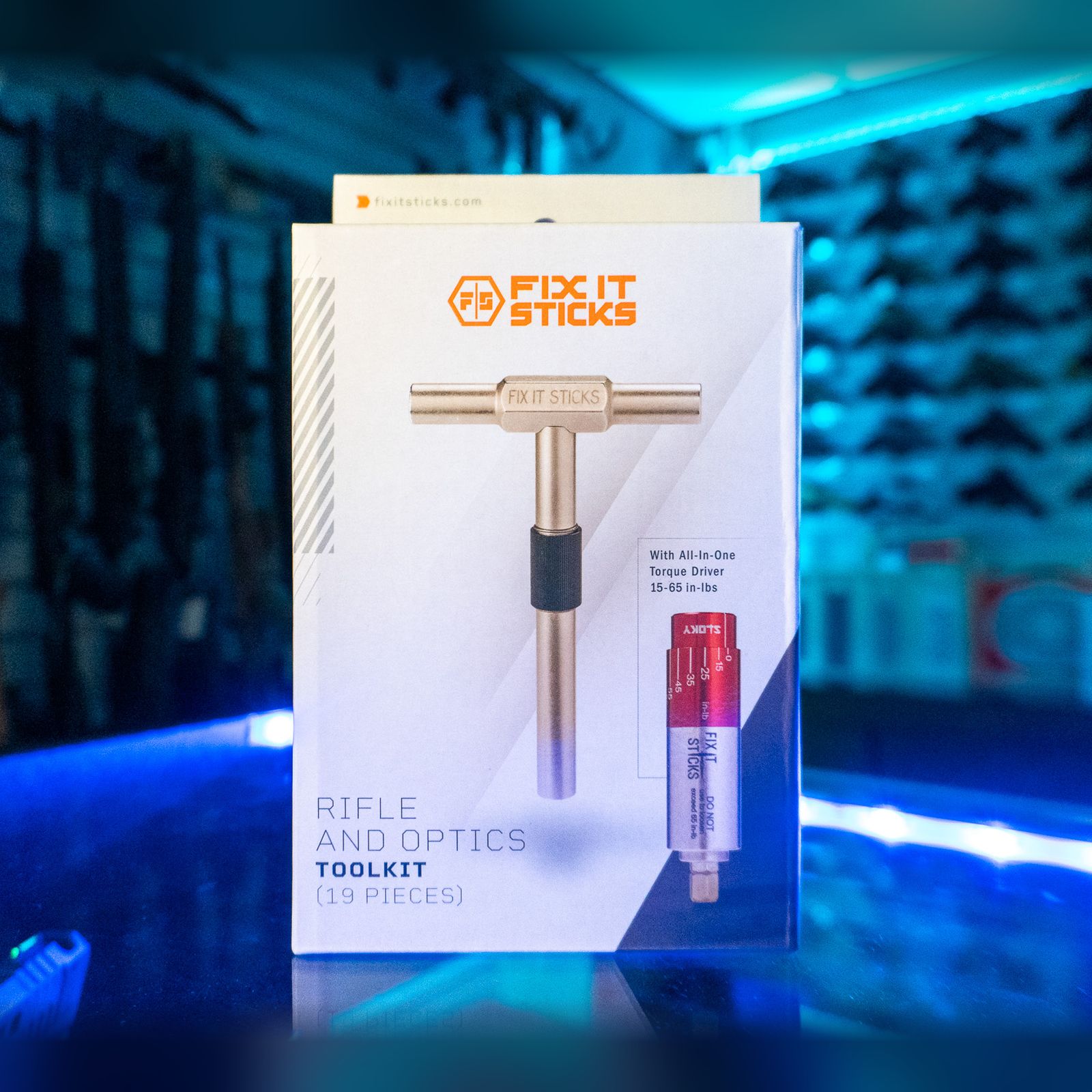 Fix It Sticks Rifle and Optics Toolkit with All-In-One Torque Driver in its retail box on a glass store counter