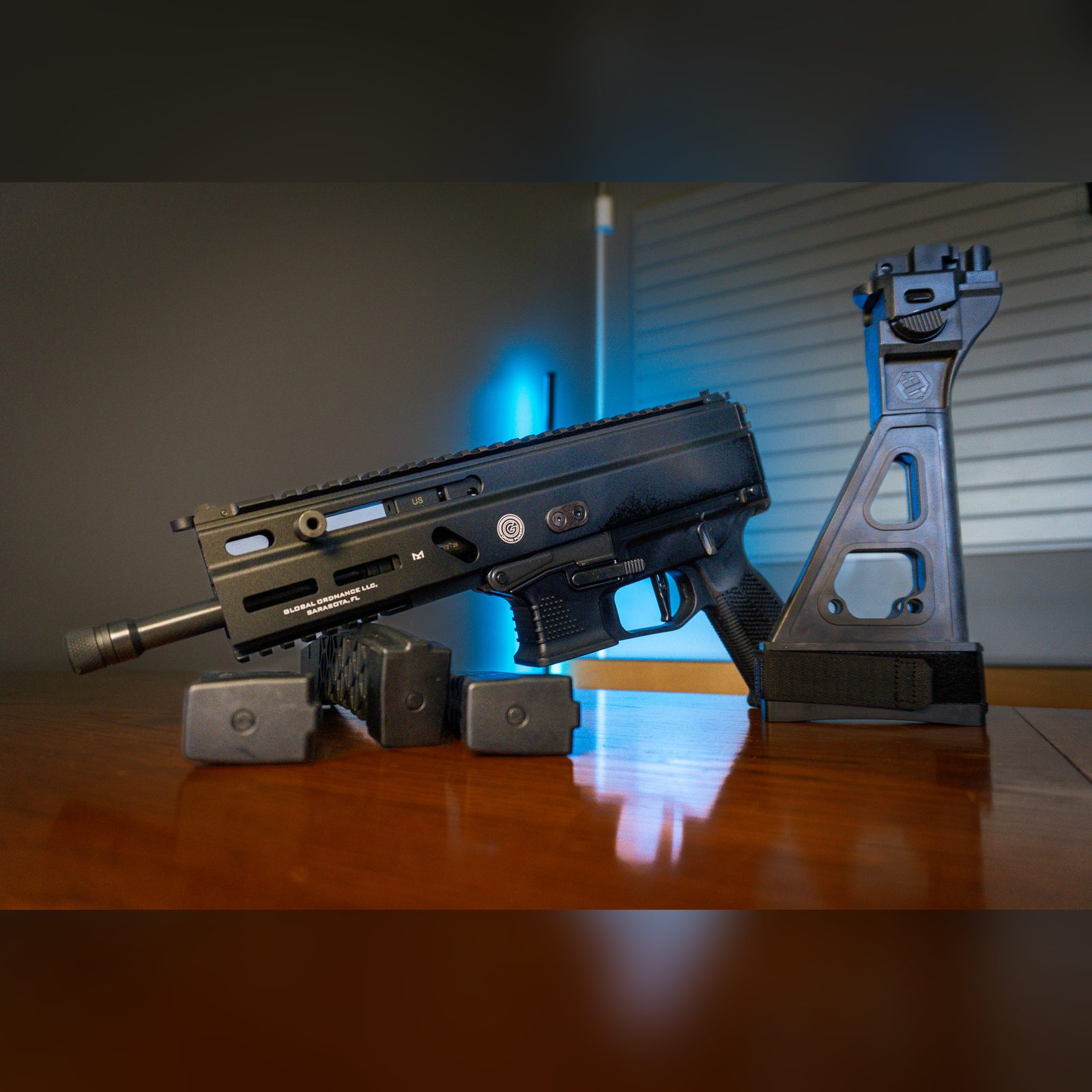 Grand Power Stribog SP9A3 9mm pistol with threaded barrel, M-LOK handguard and Picatinny top rail, shown with SB Tactical folding brace and three magazines