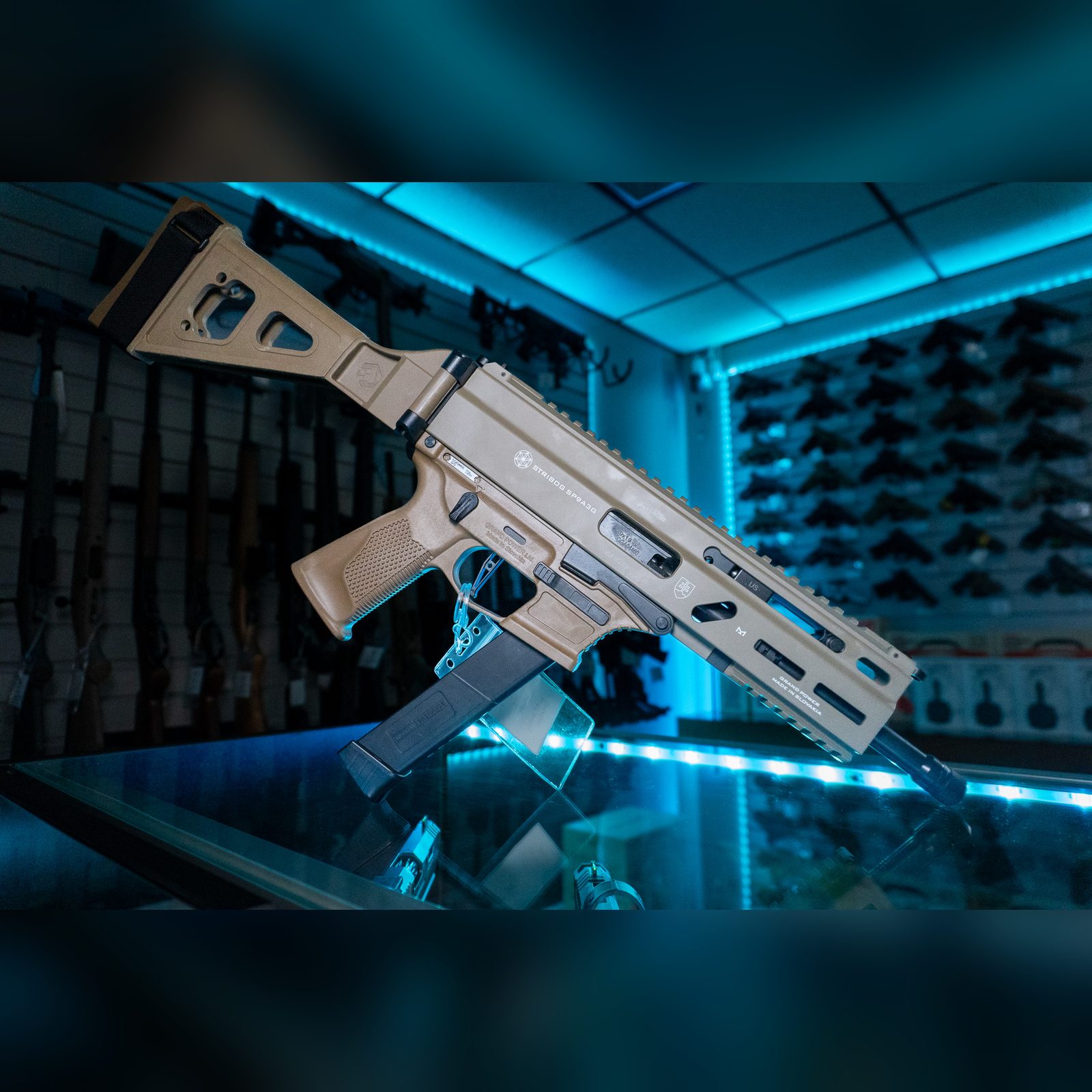 Grand Power Stribog SP9A3G 9mm pistol in Flat Dark Earth with SB Tactical folding brace, threaded barrel, M-LOK handguard and Glock-pattern magazine