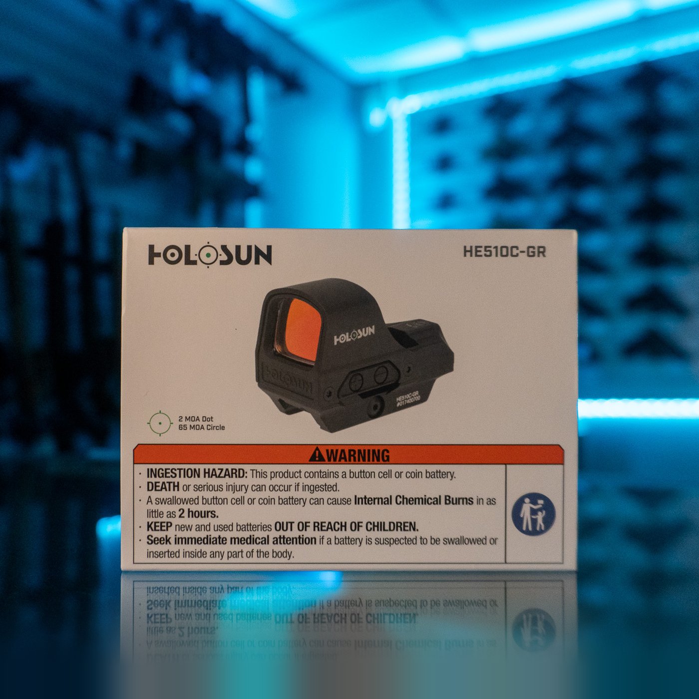 Holosun HE510C-GR black open reflex green dot sight, retail box on a glass display counter