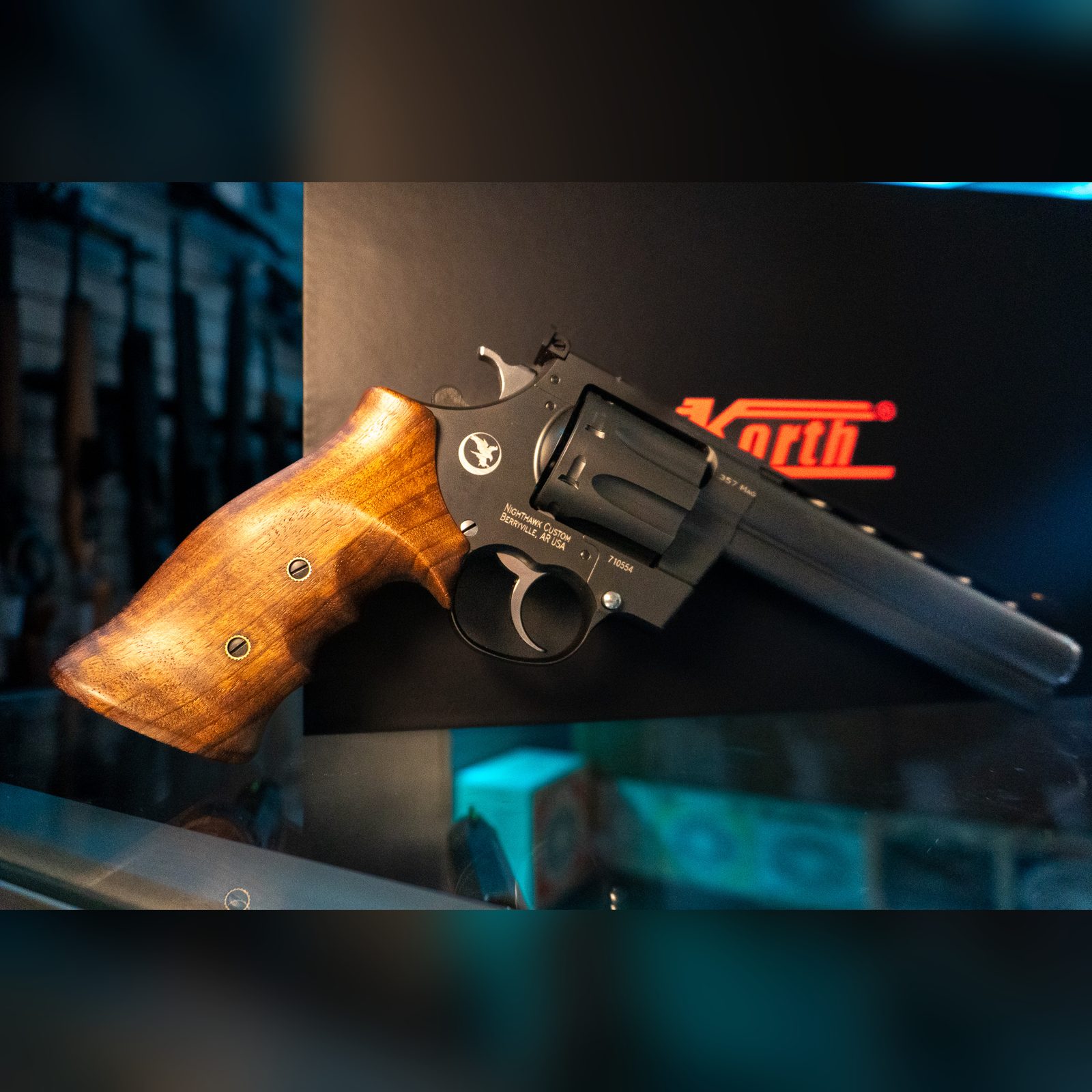 Korth Mongoose 8-Shot .357 Magnum revolver, left side with finger-groove walnut grip, fluted eight-round cylinder and ventilated rib
