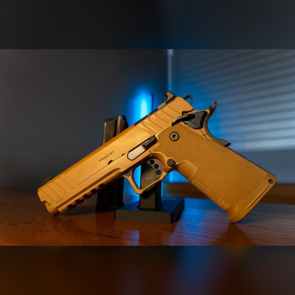 Springfield Armory 1911 DS Prodigy AOS 9mm pistol in Coyote Brown Cerakote, left side with Prodigy slide marking and fiber optic front sight
