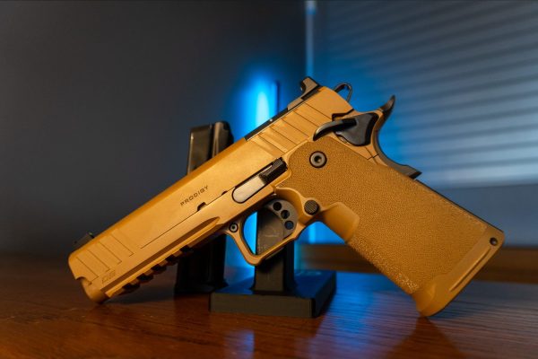 Springfield Armory 1911 DS Prodigy AOS 9mm pistol in Coyote Brown Cerakote, left side with Prodigy slide marking and fiber optic front sight