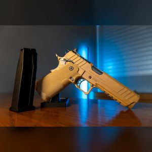 Springfield Armory 1911 DS Prodigy AOS 9mm pistol in Coyote Brown Cerakote, right side with Springfield Armory slide marking and a double-stack magazine