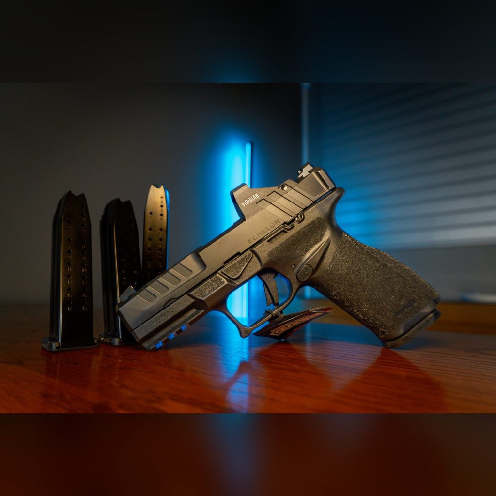 Springfield Echelon 4.0FC Gear Pac 9mm pistol, left side, with factory Viridian RFX11 green dot and spare magazines