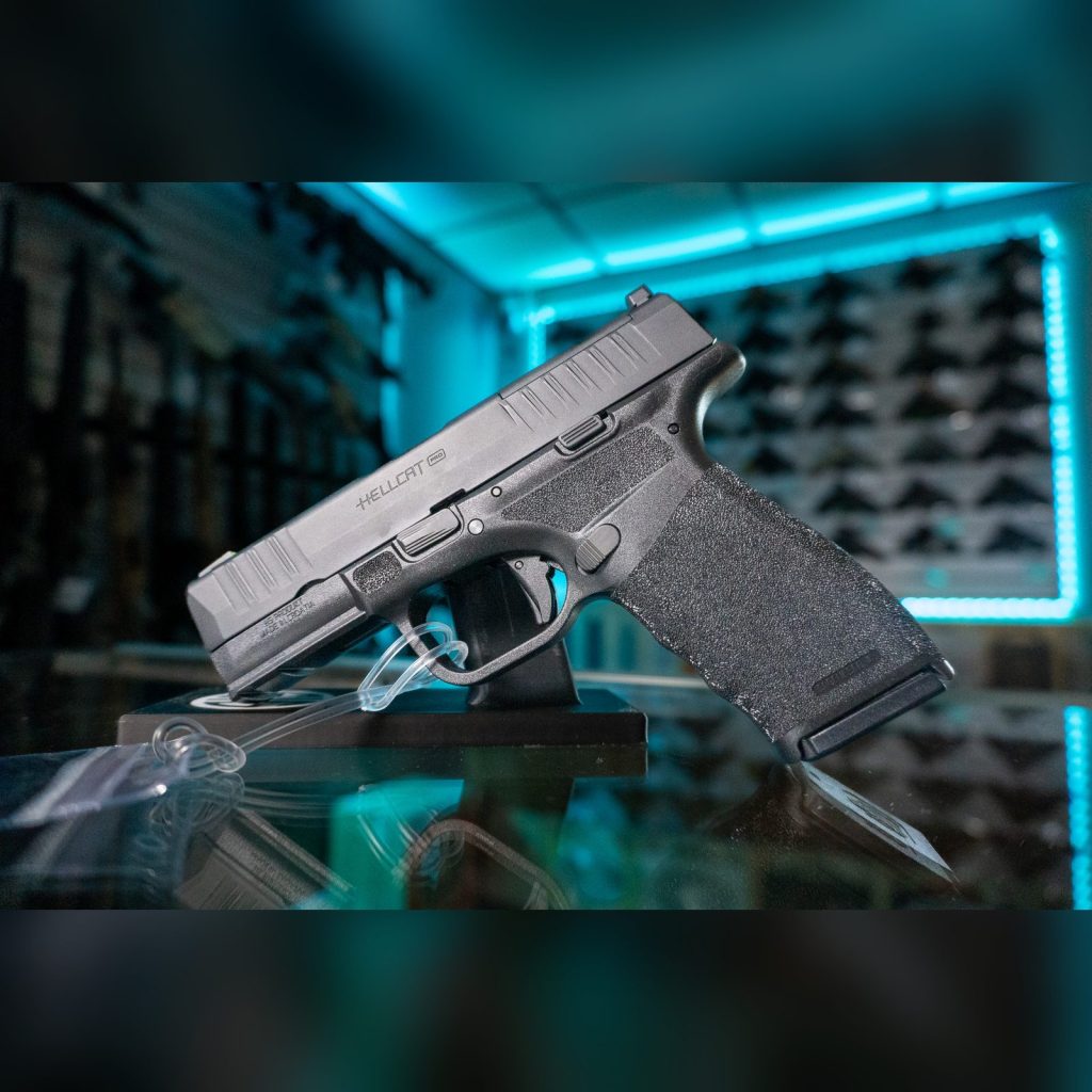 Springfield Armory Hellcat Pro OSP 9mm pistol in black, left side with Hellcat Pro slide marking, optics ready slide and adaptive grip texture