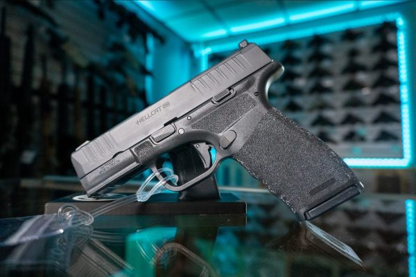 Springfield Armory Hellcat Pro OSP 9mm pistol in black, left side with Hellcat Pro slide marking, optics ready slide and adaptive grip texture