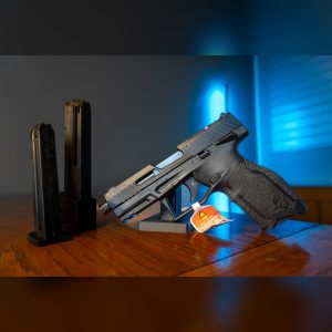 Taurus TX22 Gen 2 TORO .22 LR pistol in black with threaded barrel and optic-ready slide, left side, with 22-round and 16-round magazines